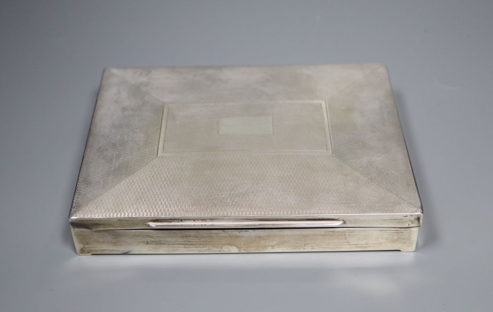 A George V part engine turned silver mounted rectangular cigarette box, William Adams Ltd, Birmingham, 1933, 16.1cm,